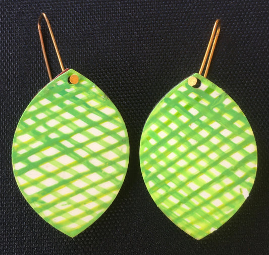 leafy shape green Criss cross lined earrings with white background reversible with impressionistic design on the back