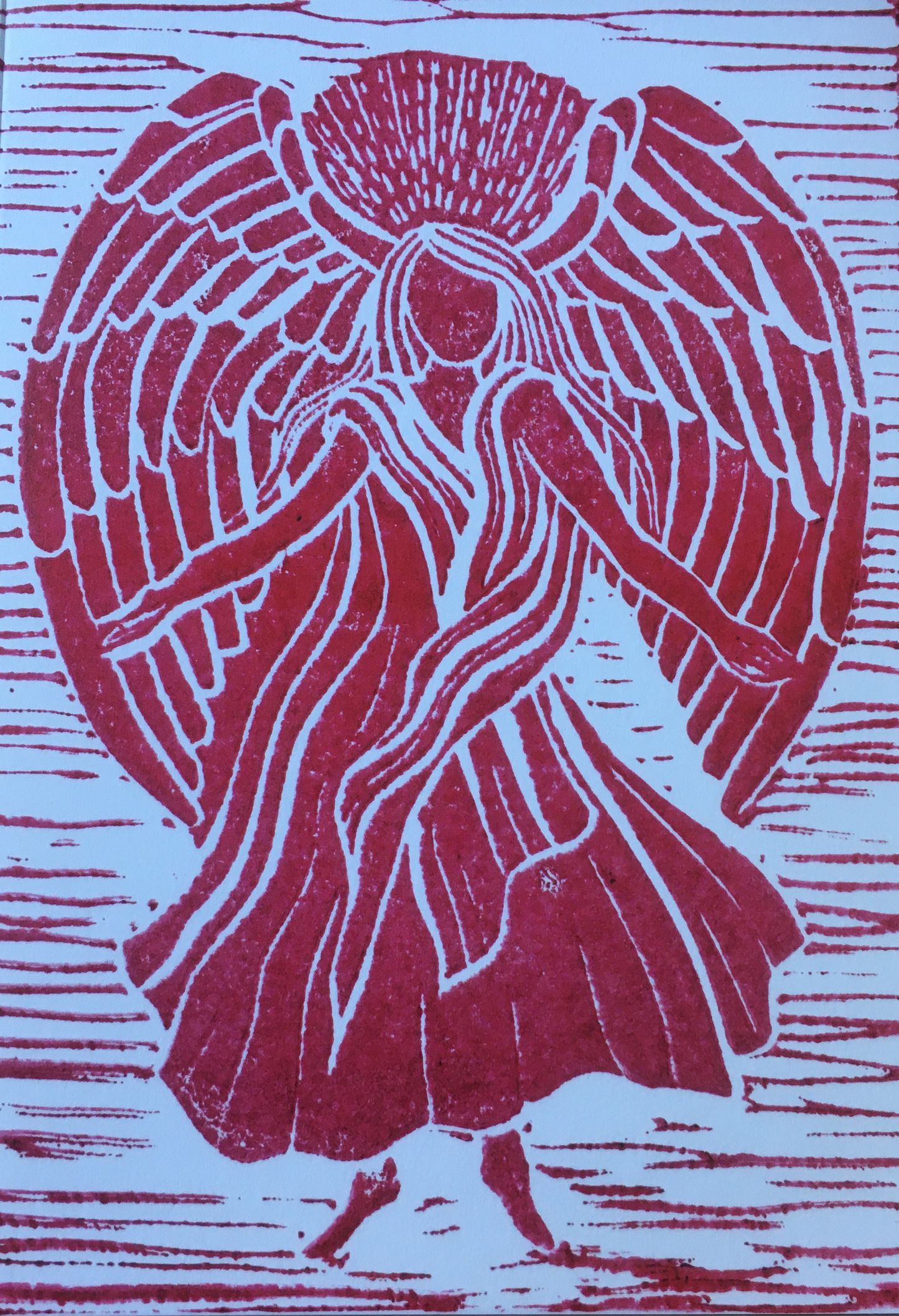 An Angel card from a Lino cut red.